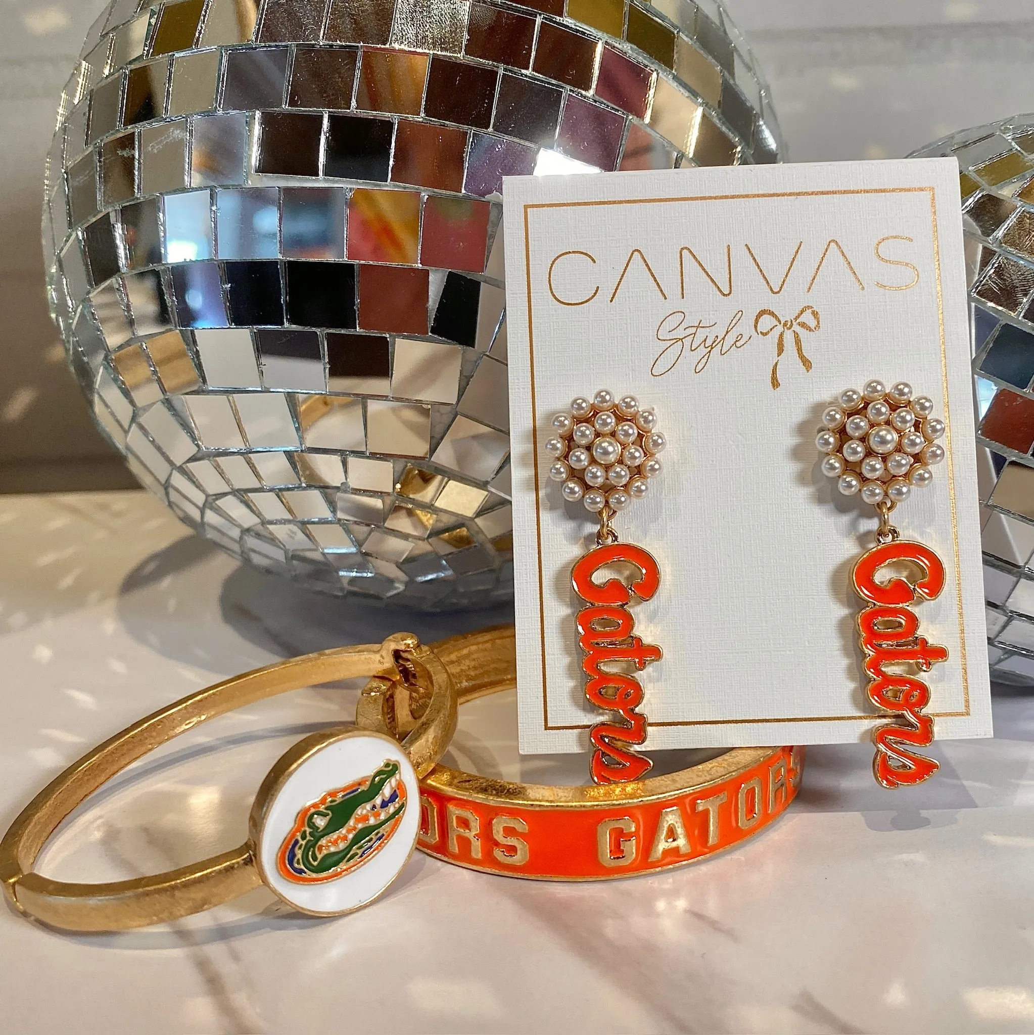 FLORIDA GATORS ENAMEL LOGO HINGE BANGLE IN ORANGE